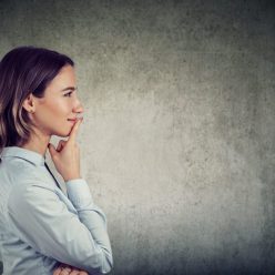 Woman-thinking-about-improving-emotional-intelligence-894×612
