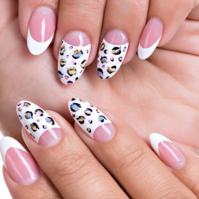 Beautiful woman's nails with beautiful french manicure