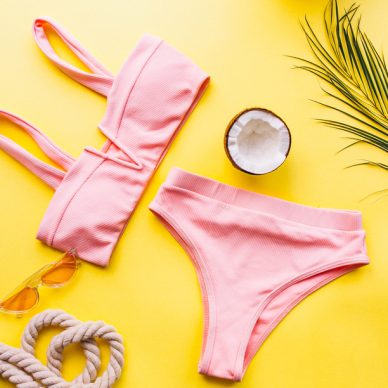 Swimsuit on yellow background isolated