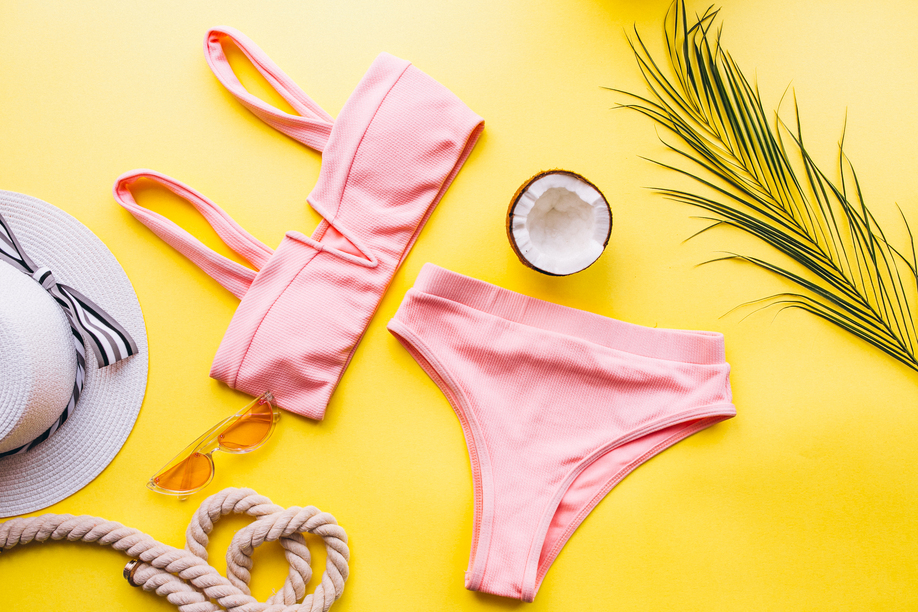Swimsuit on yellow background isolated