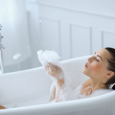 Hygiene. Beautiful girl in a bathtub