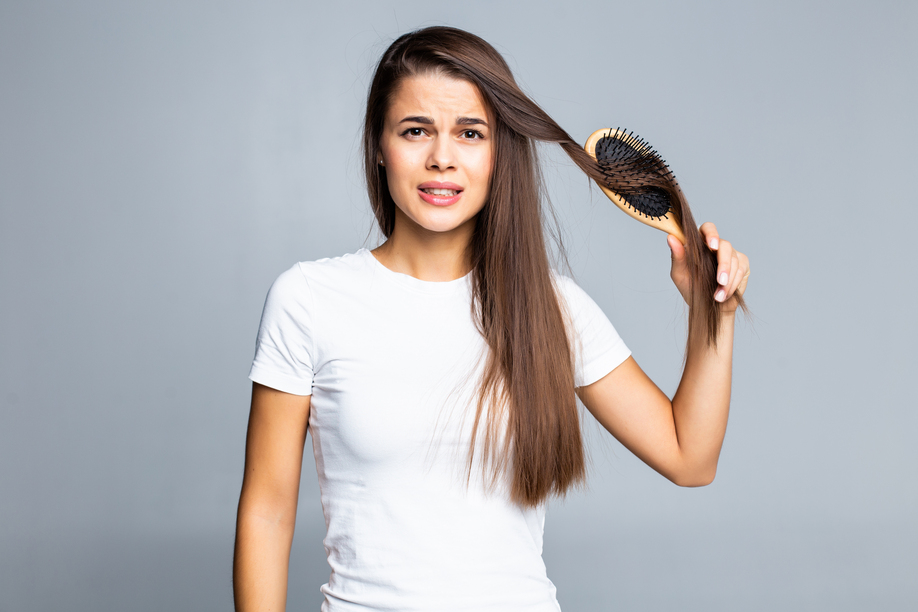 Woman problems with hair, split weak hair, tangled hair