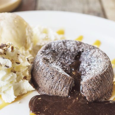 Chocolate lava cake in white plate