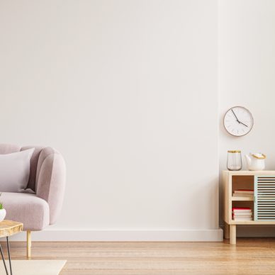 Interior wall mockup with sofa and cabinet in living room with empty white wall background.3D rendering