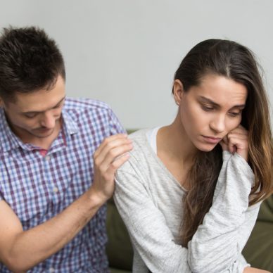 Caring husband supporting comforting upset wife getting depressed after miscarriage, boyfriend consoling sad grieving girlfriend feeling empathy, infertility diagnosis, sympathy in marriage concept