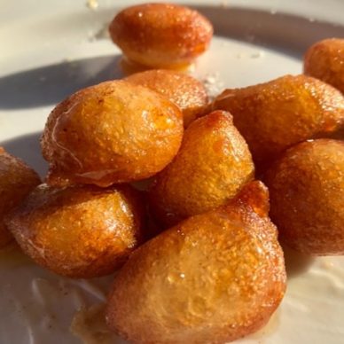 Greek food- loukoumades (fried fritters with honey)