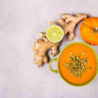 Spicy pumpkin cream soup with ginger and lime