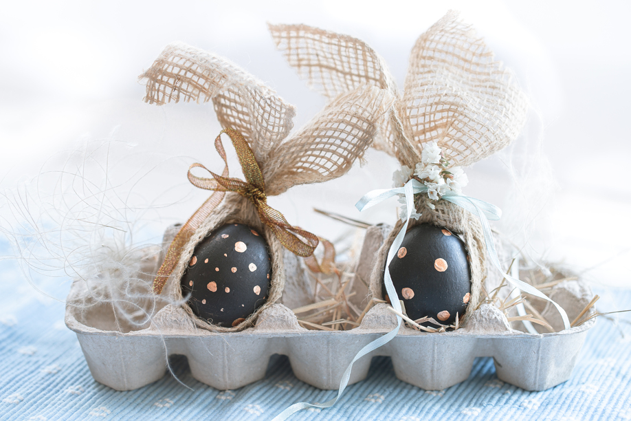 Decorated Easter eggs in black with gold pattern. The concept of the Easter holiday .