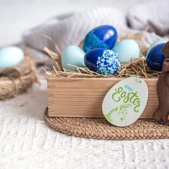Easter still life with blue eggs, holiday decor .