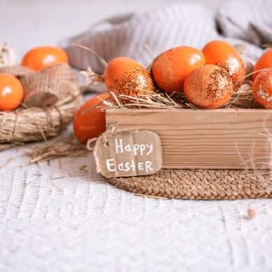 Easter still life with orange eggs, holiday decor . Easter cozy mood.