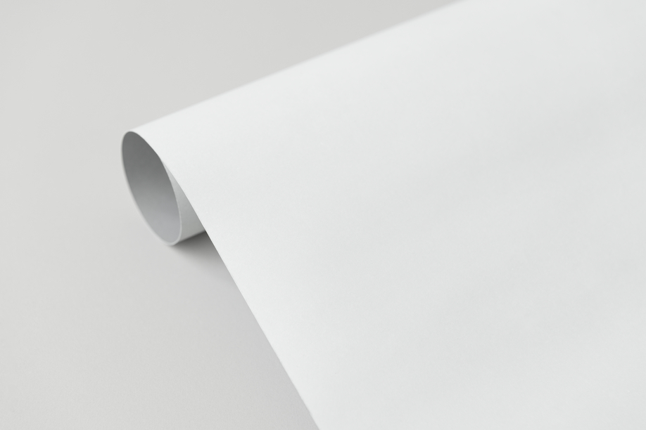 Gray and white rolled paper on a gray background