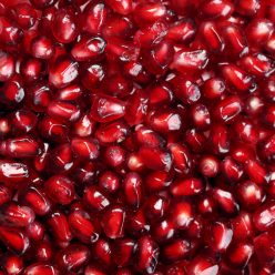 Exotic and delicious pomegranate on white background