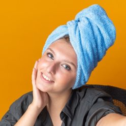 smiling-beautiful-woman-wrapped-hair-towel-taking-selfie-putting-hand-hand-cheek_141793-121527 (1)