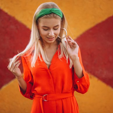 Happy woman in red dress on a vacation