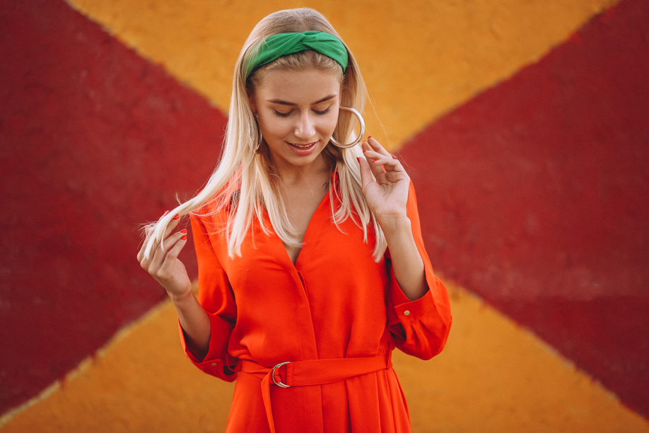 Happy woman in red dress on a vacation