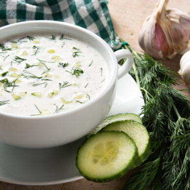 Bulgarian tarator sour milk soup on wooden table