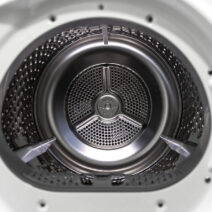 Interior view of a washing machine, dryer.